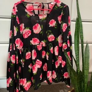 Black floral top with bell sleeves